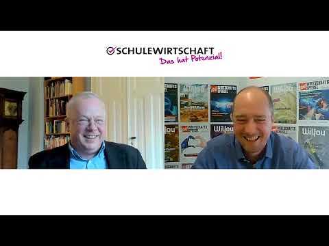 Foto von zwei Männern in einem digitalen Meeting