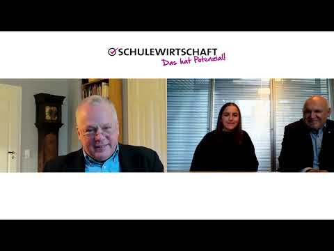 Foto von drei Teilnehmern eines digitalen Meetings